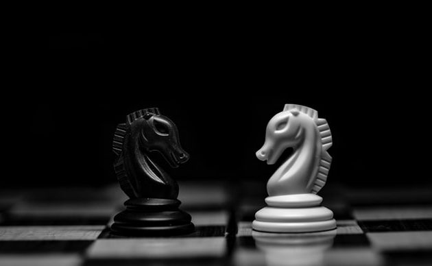 conflicts represented by opposing black and white chess knights